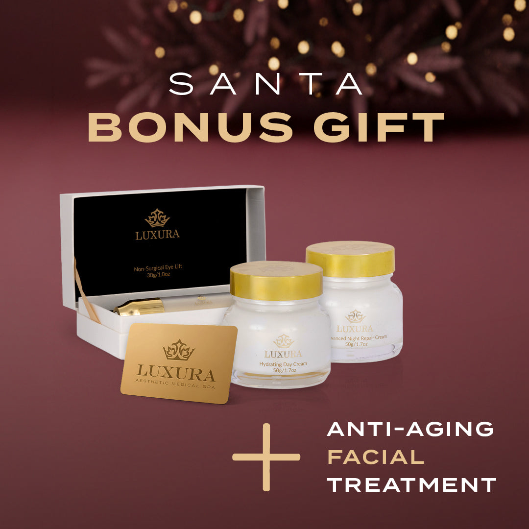 Luxura anti-aging facial treatment set with jars and a box on a maroon background.