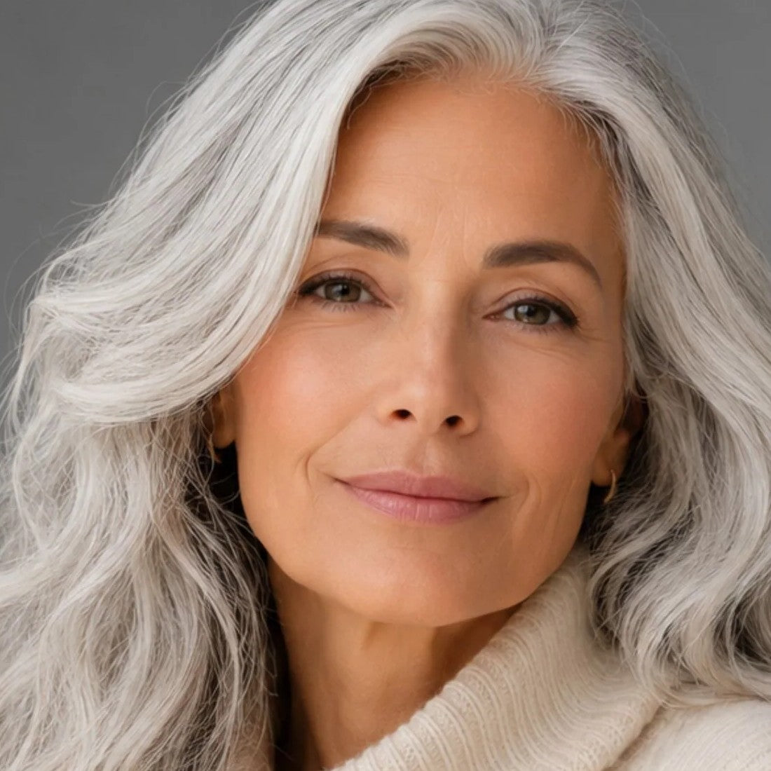 Luxura model with hydrated, luminous mature skin